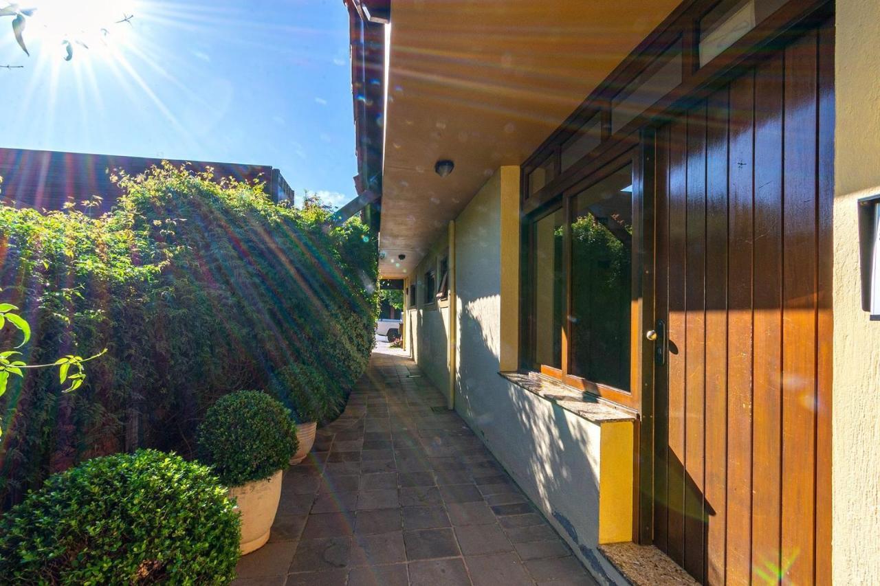Rosa Edificio Jardim Da Serra Gramado Exterior foto
